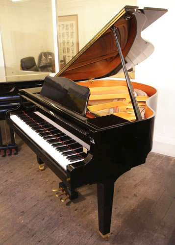 Yamaha GA1 baby grand Piano for sale with a black case and polyester finish.