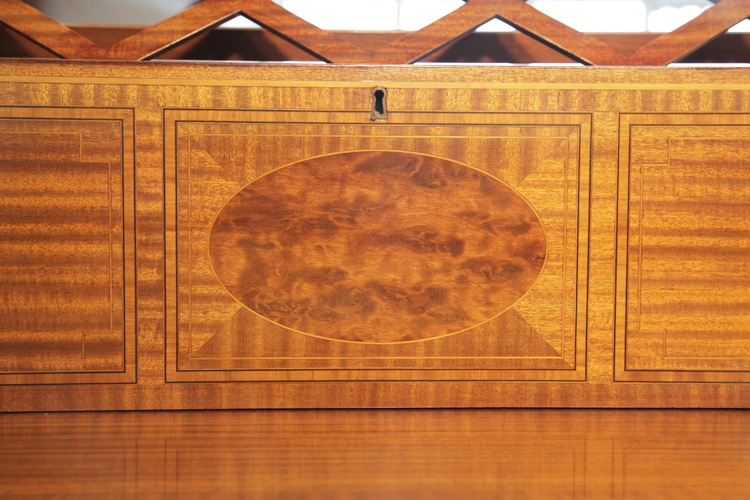 Cabinet features walnut, satinwood and boxwood inlay