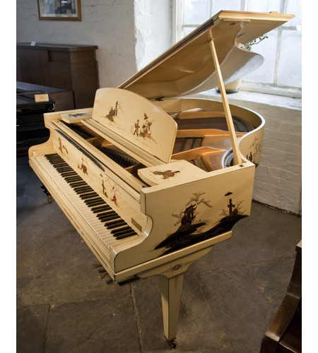 A D'Almaine grand piano with a cream case, covered with Japanese paintings