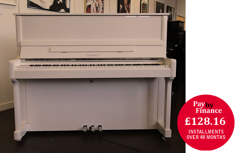 Brand New, Feurich Model 122 upright Piano for sale with a white case.