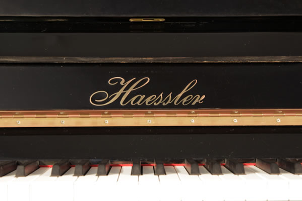 Haessler Upright Piano for sale.