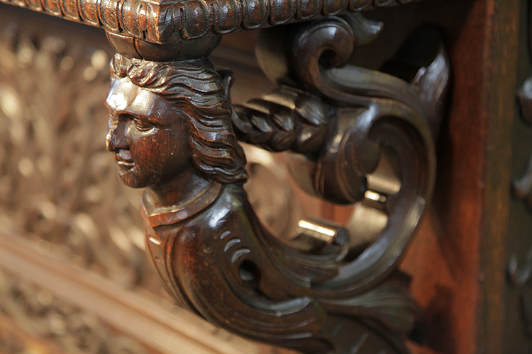 Mand piano carved caryatid detail