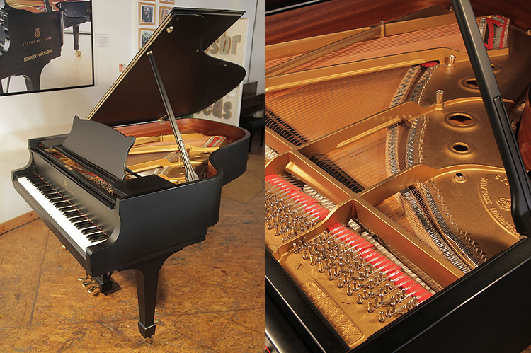 A 2000, Steinway Model A grand piano with a satin, black case and spade legs