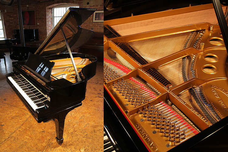 A 1923, Steinway Model O grand piano with a black case and spade legs 