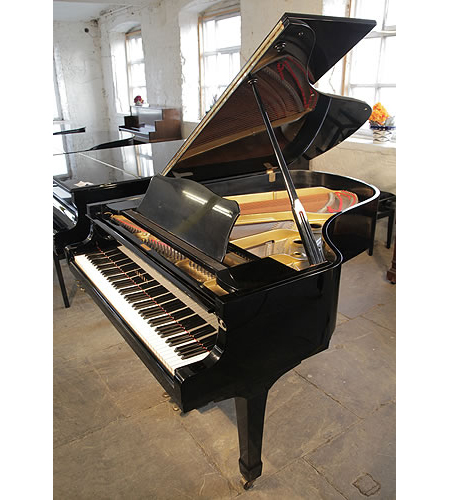 A 1975, Yamaha G3 grand piano for sale with a black case and spade legs