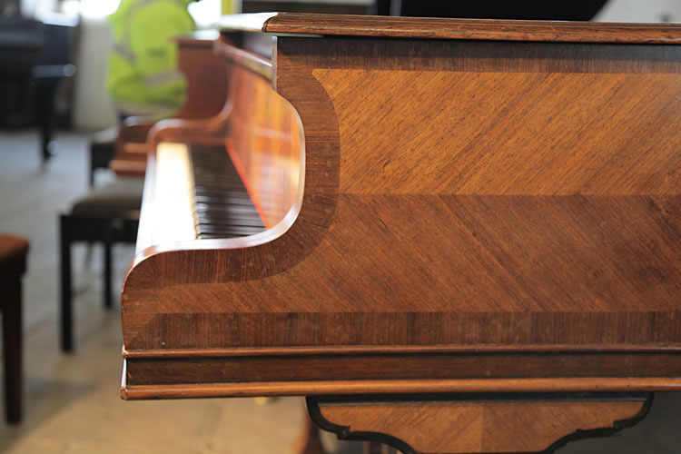 Gaveau grand piano for sale with a quartered, walnut case Gaveau