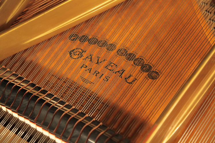 Gaveau grand piano for sale with a quartered, walnut case Gaveau