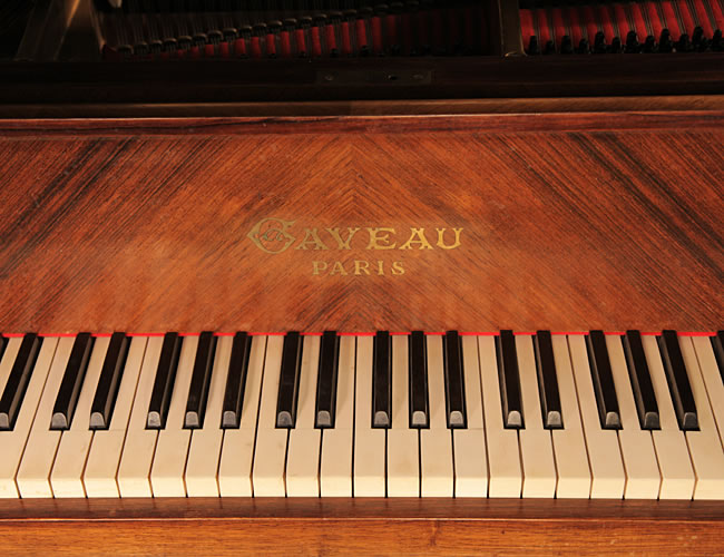 Gaveau grand piano for sale with a quartered, walnut case Gaveau