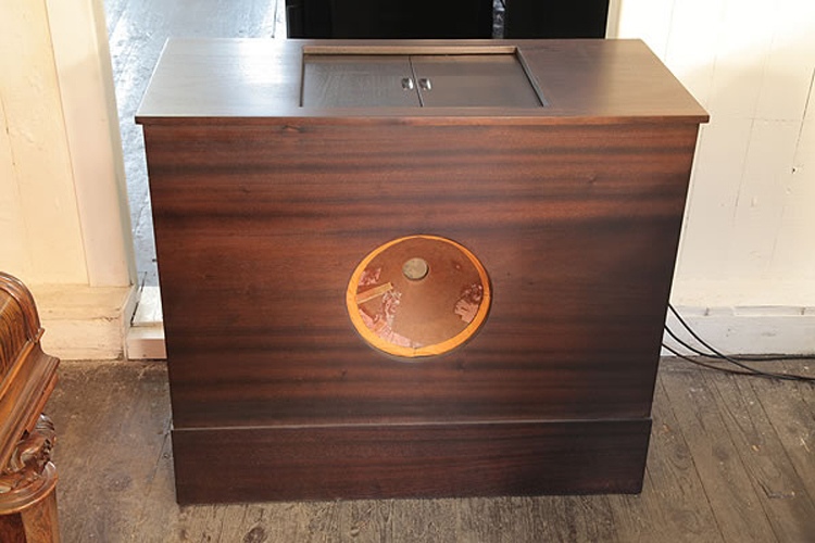 The Neo-Bechstein record player sits at the top of the loudspeaker and has closeable doors
