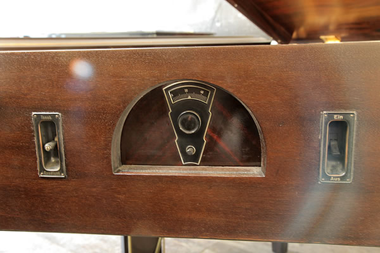 The Neo-Bechstein radio sits within the piano cabinet