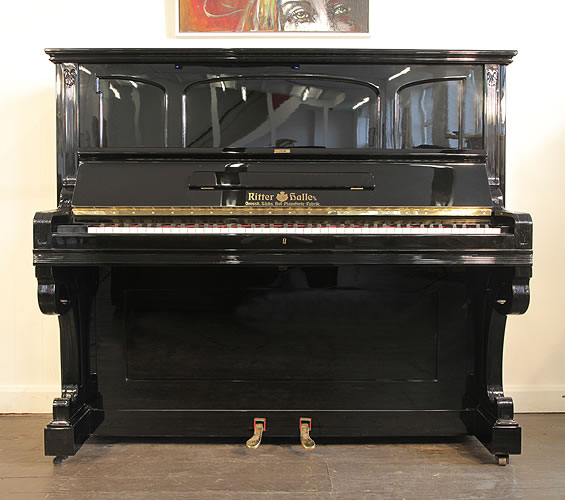 Antique, Ritter Halle upright Piano for sale with a black case.