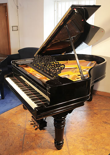 A  1900,  Steinway Model A grand piano with a black case and turned, fluted legs