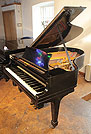 Piano for sale. A  Steinway Model O grand piano with a black case