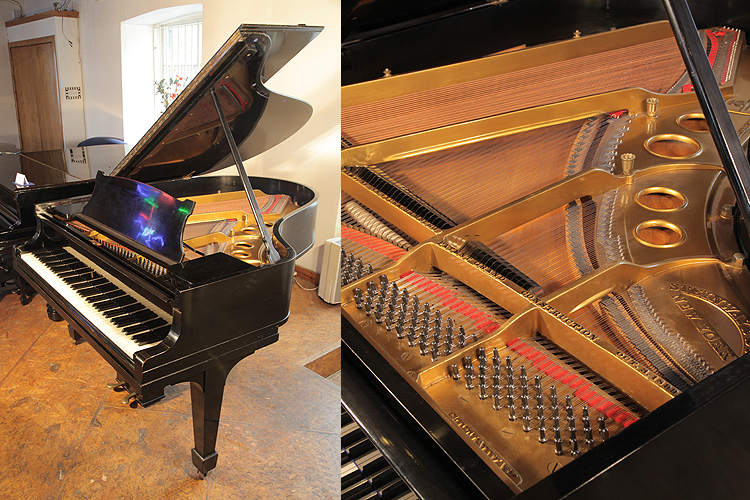 A 1922, Steinway Model O grand piano with a black case and spade legs