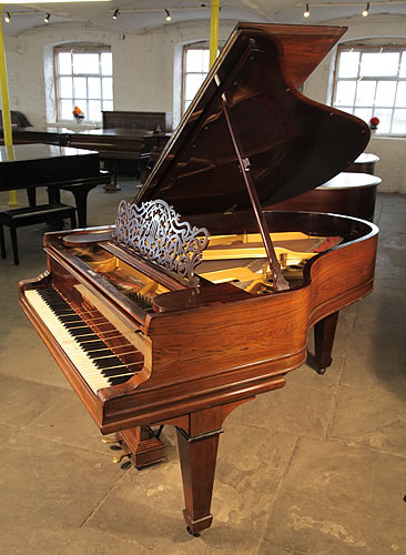 An unrestored, 1901, Steinway Model A grand piano with a rosewood case, filigree music desk and spade legs
