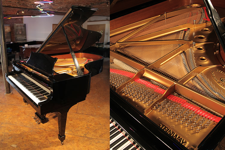 A 2004, Steinway Model B grand piano with a black case and spade legs