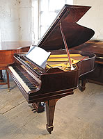 An unrestored, 1923, Steinway Model O grand piano with a fiddleback mahogany case and spade legs