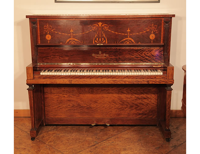 A 1906, Steinway Vertegrand Upright Piano For Sale with a Fiddleback Mahogany Case Inlaid with Swags and Scrolling Foliage.