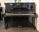 Piano for sale. A secondhand, Yamaha U3 upright piano with a black case and polyester finish. 