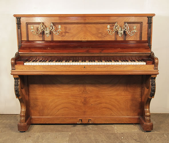 Bord Upright Piano For Sale with a Quartered, Walnut Case with Carved Accents and Ornate Brass Candlesticks