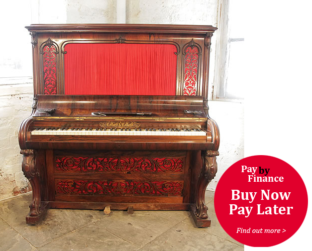 Collard and Collard upright piano with a rosewood case, ornate, filigree panels  and carved, cabriole legs