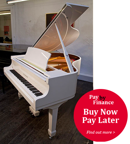 White, Steinhoven Model 148 baby grand Piano for sale.