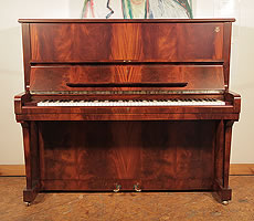 A 1997, Crown Jewels, Steinway Model K upright piano with a flame mahogany case