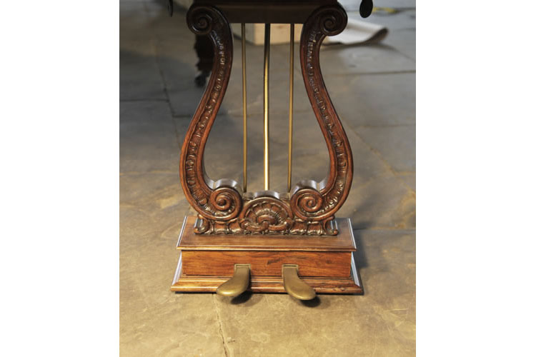 Bluthner traditional shaped piano lyre with carved shells and scrolls
