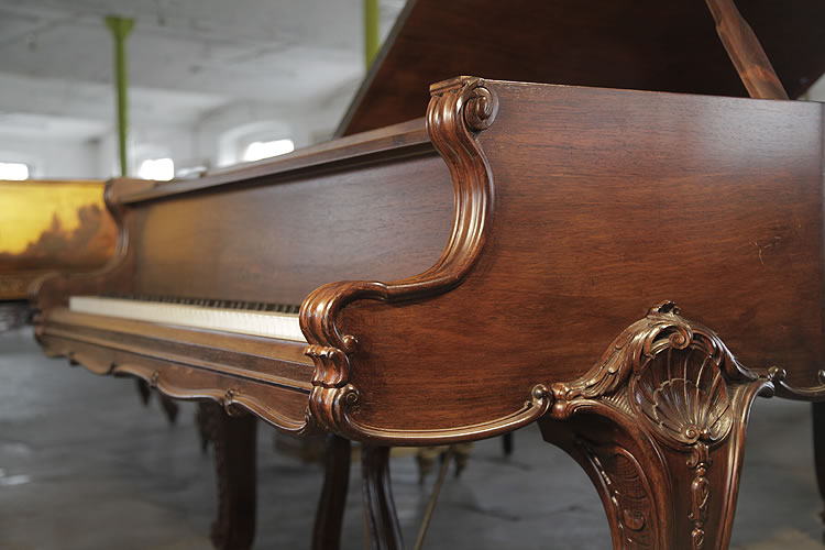Bluthner elegant scrolling piano cheek with carved detail