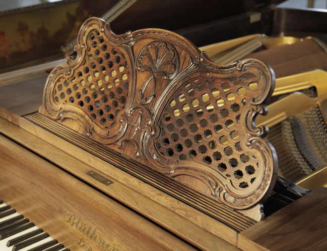 Bluthner open work lattice music desk with carved detail