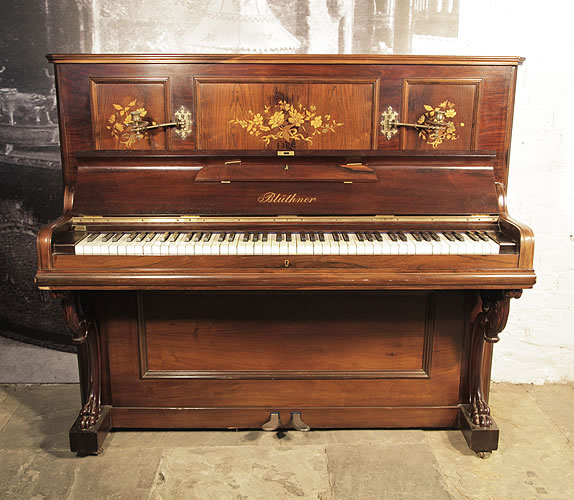 A 1905, Bluthner upright piano for sale with a rosewood case and floral inlaid panels