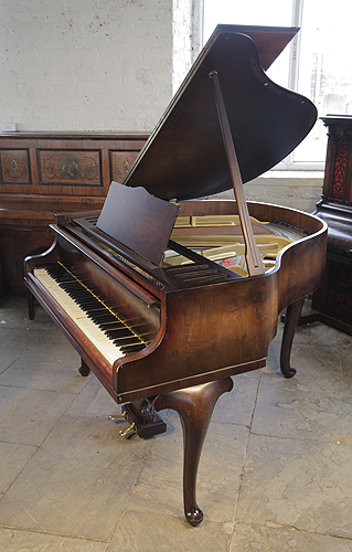 Feurich baby grand piano for sale with a walnut case and cabriole
