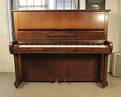 A 1961, Steinway Model V upright piano with a mahogany case