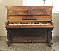 An 1896, Steinway upright piano with a rosewood case and floral inlaid panels
