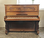 Piano for sale. An 1896, Steinway upright piano with a rosewood case and floral inlaid panels