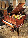Piano for sale. A  Bluthner grand piano for sale with a rosewood case, slatted music desk and square legs
