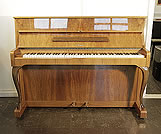 Piano for sale. A 1963, Sauter upright piano with a walnut case and cabriole legs 
