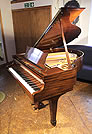 Piano for sale. A rebuilt, 1937, Steinway Model S baby grand piano for sale with a mahogany case and spade legs