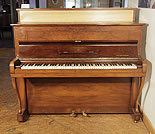 Piano for sale. A 1951, Steinway Model Z upright piano with a mirrored, walnut case and cabriole legs