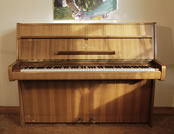 Piano for sale. A 1970, Steinway Model Z upright piano with a mahogany case.
