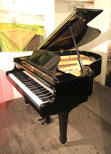 Yamaha G2 grand piano for sale with a black case and polyester finish.