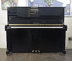A 1988, Yamaha MC10Bl Upright Piano For Sale with a Black Case and Brass Fittings