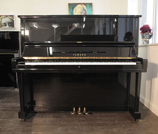 Piano for sale. A secondhand, Yamaha U3 upright piano with a black case and polyester finish. 