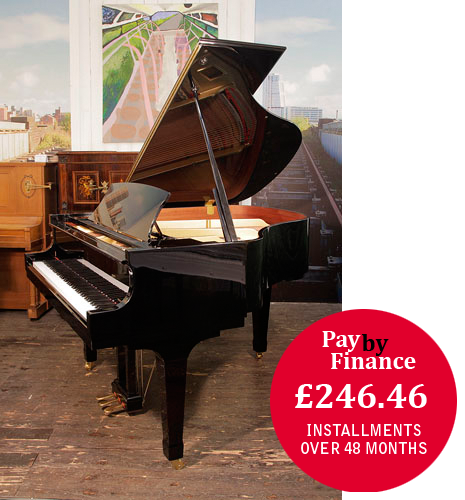 A 2008, Boston GP156 baby grand piano for sale with a black case and polyester finish.