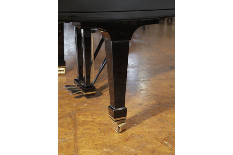 Fazioli F212 spade piano leg with dual castors