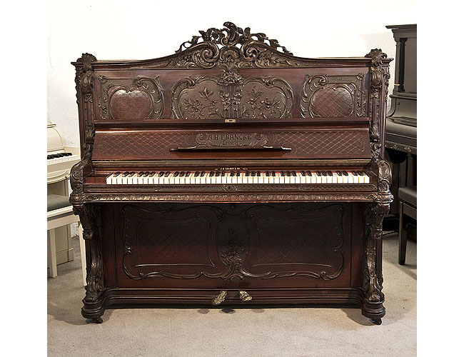 Rococo style, Francke upright piano for sale with an ornately carved, mahogany case and reverse scroll legs