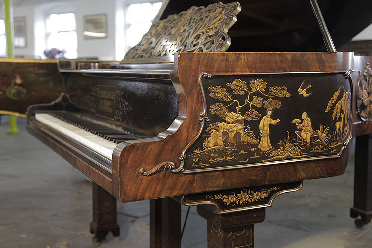 Schiedmayer serpentine piano cheek features an oriental scene in embossed Japanning. Beneath the bows of a tree, beside a pagoda, a female figure stretches out her hand towards a seated man, fanning himself as a swallow flies overhead