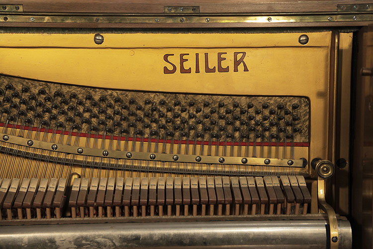 Seiler Upright Piano for sale.