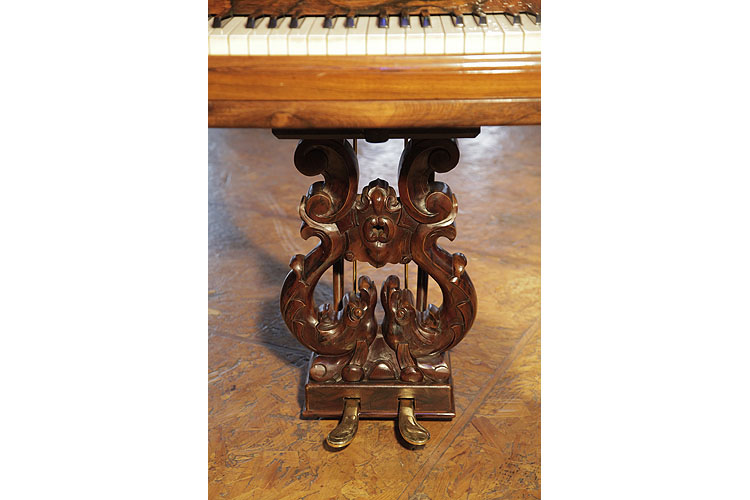 Steinway Model D two-pedal piano lyre featuring carved fish