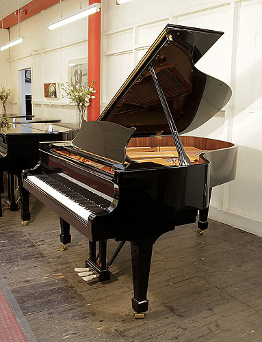 A Brand New, Toyama TC-187 Grand Piano For Sale with a Black Case and Brass Fittings
